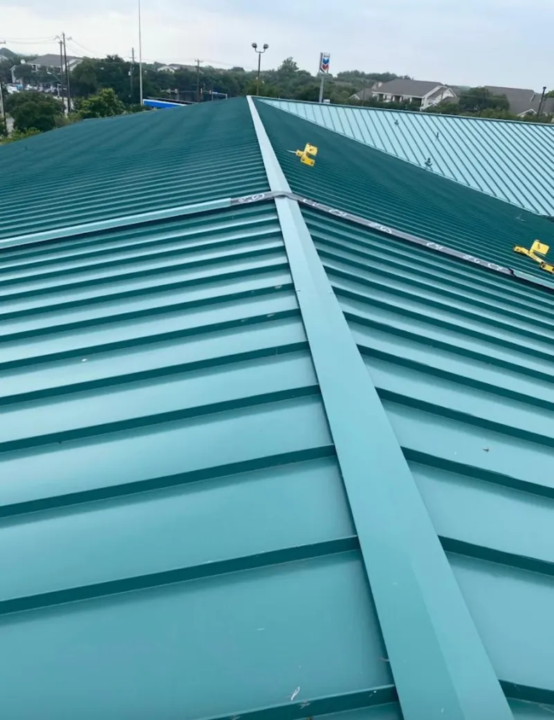 Green commercial metal roof ridge and valley for Metal Roof Repair in Homestead